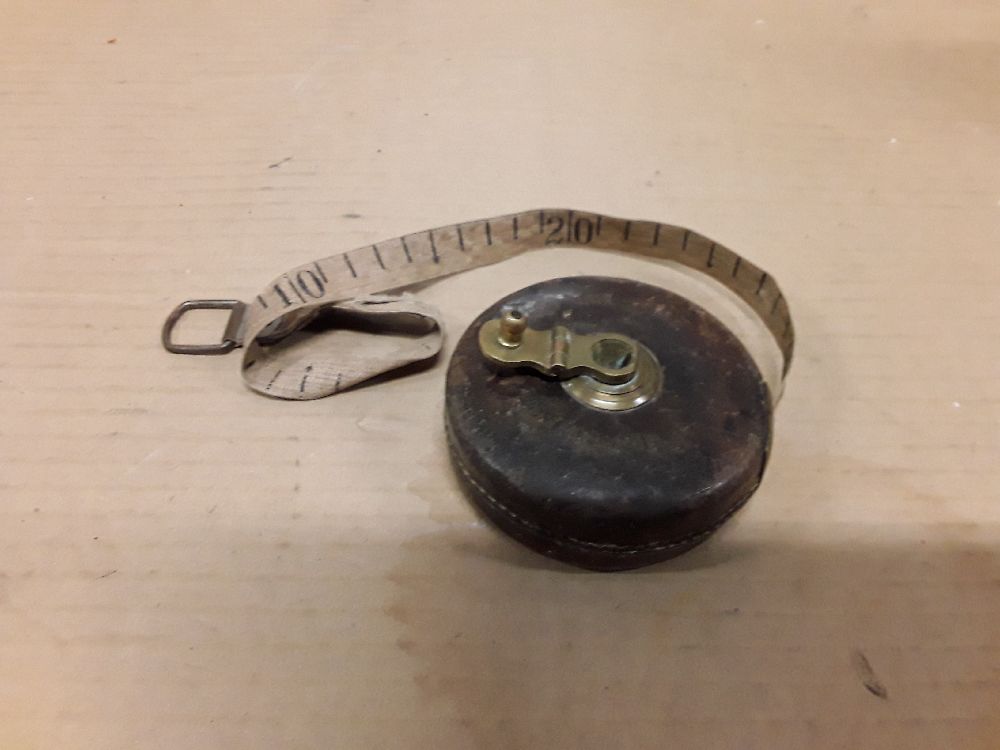 Ancien mètre cuir et laiton