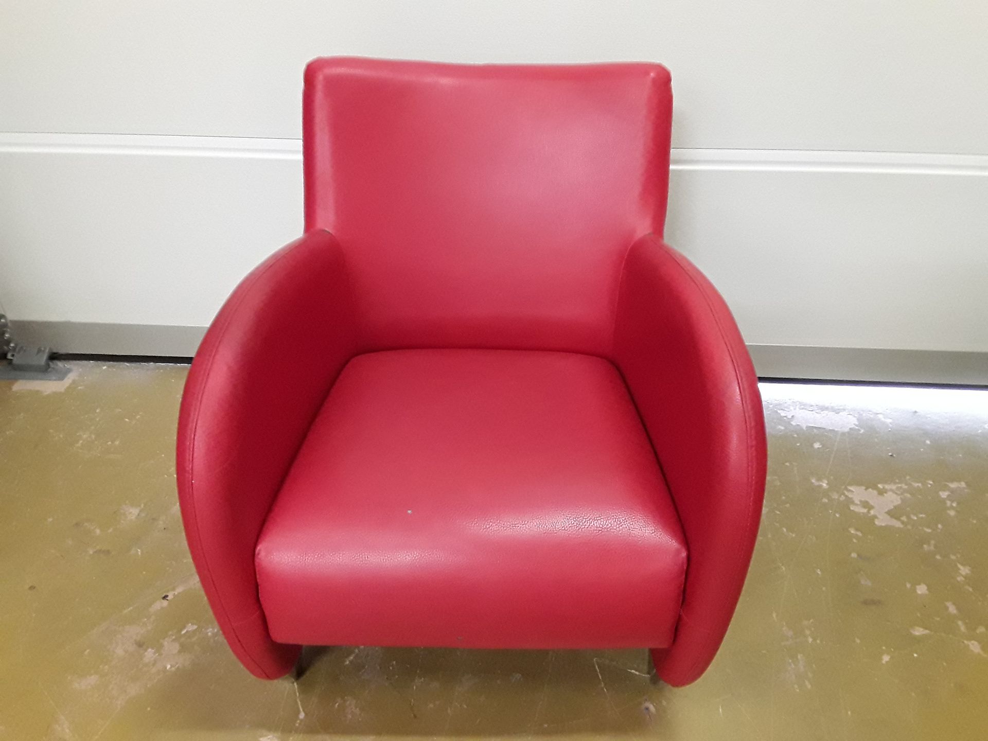 Fauteuil effet cuir en l'état